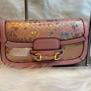 Pink and Gold Clutch with Monogram Pattern